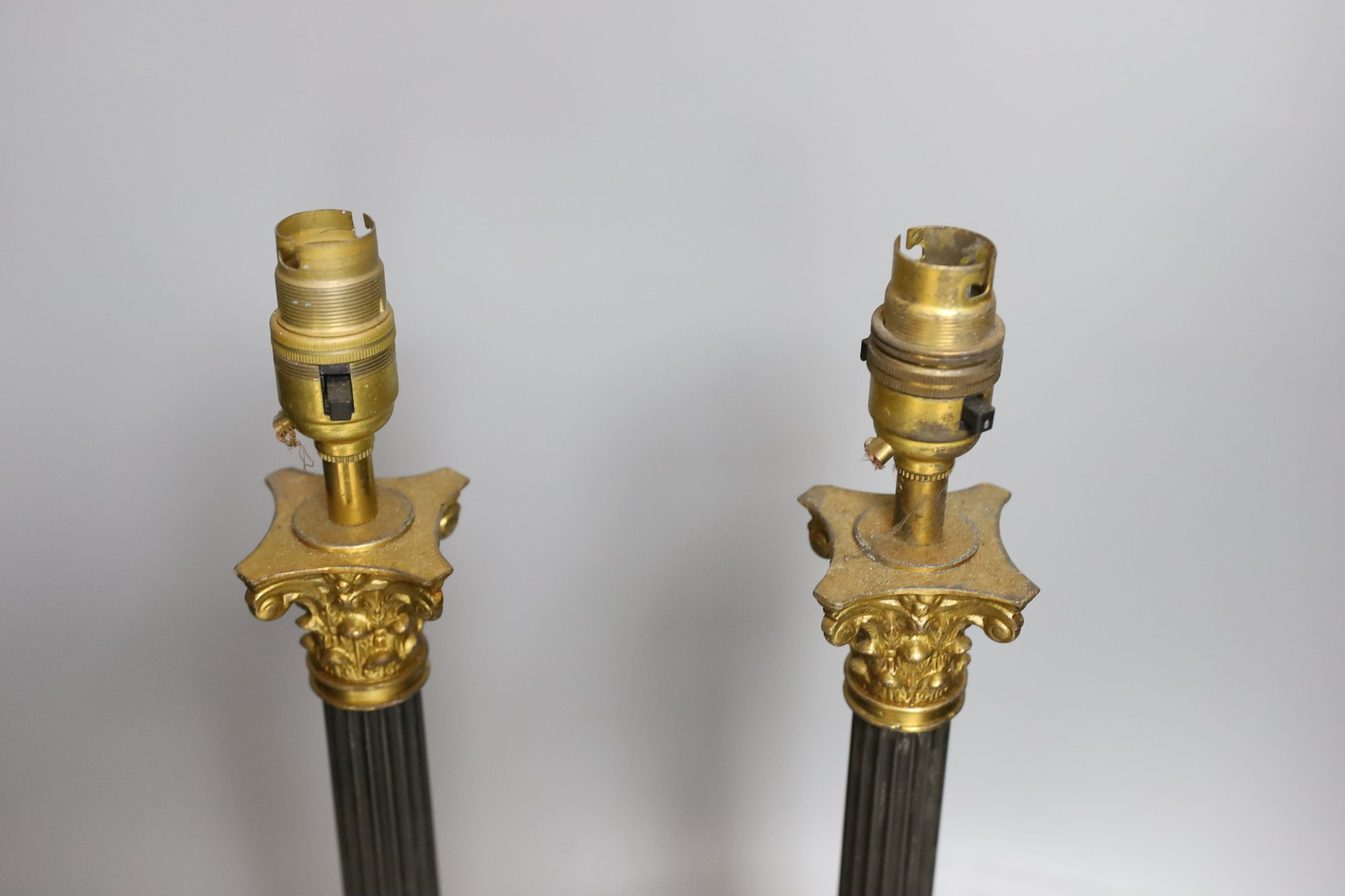A pair of Corinthian column table lamps - 43cm tall